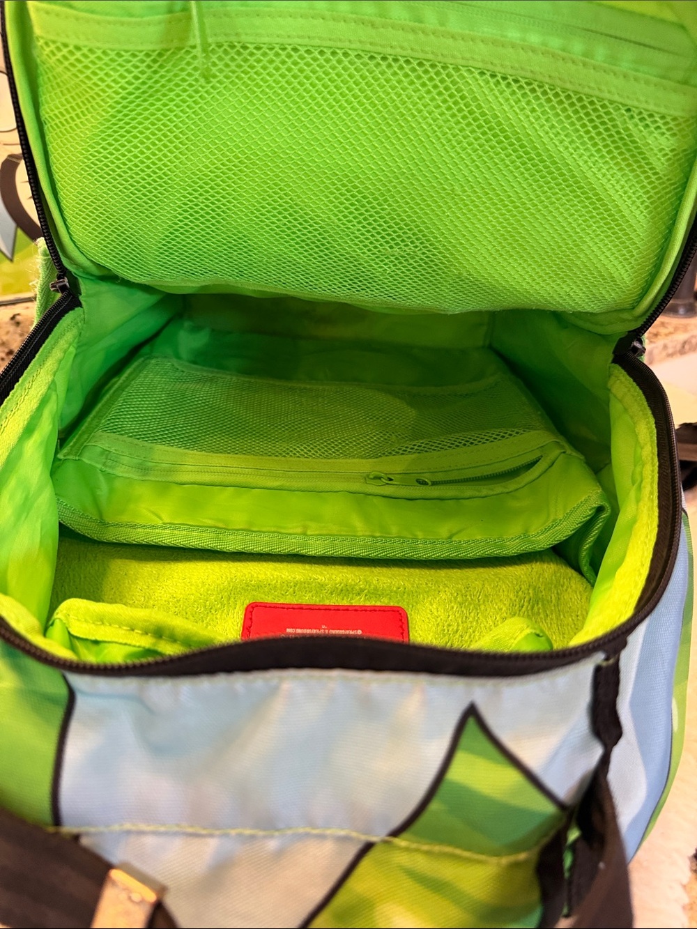 Sprayground Rick Face Backpack in Green, Black, Red, Blue - Picture 4 of 4